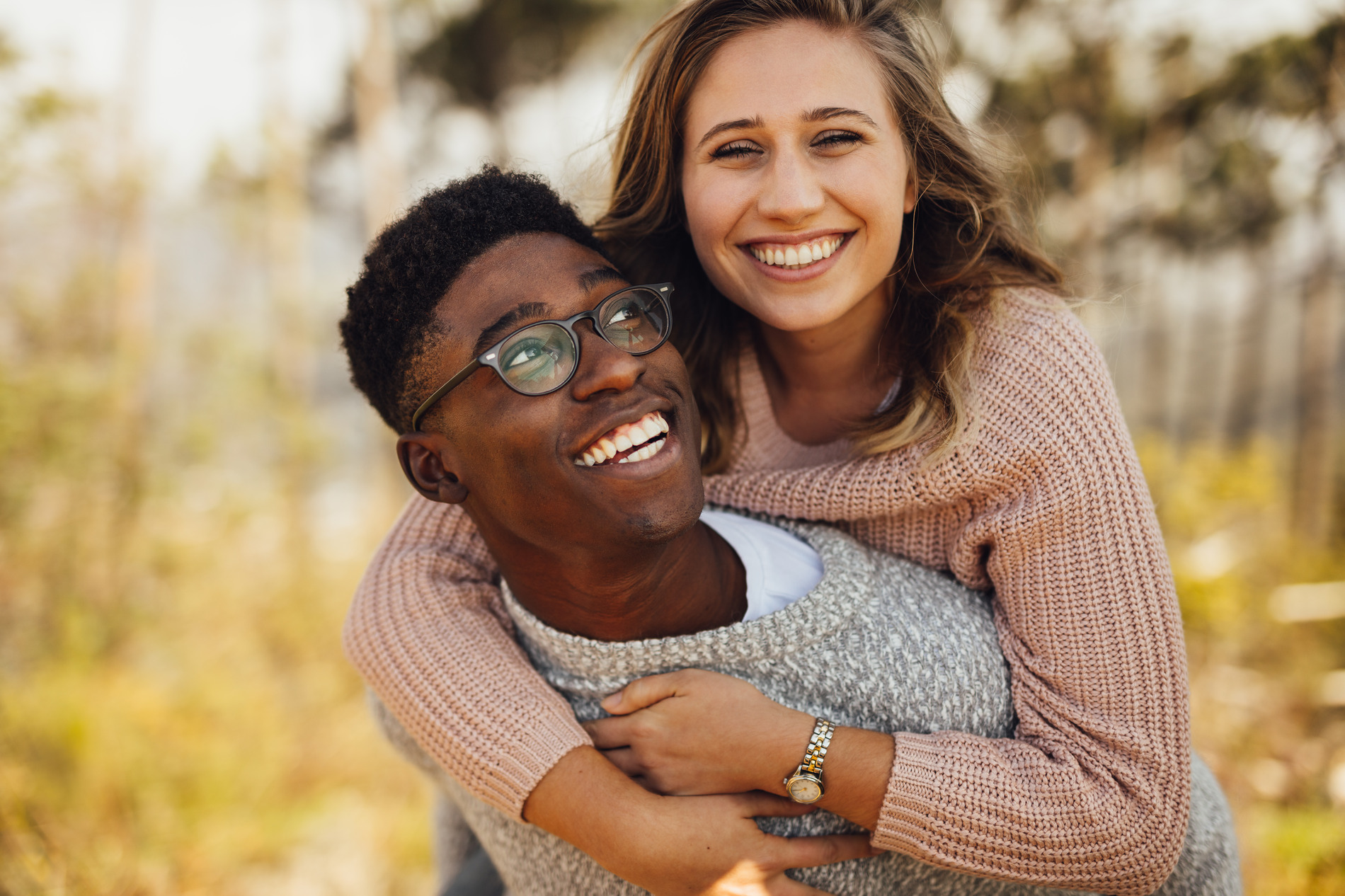 Couple hugging after signing up for a dental membership plan in St. Charles IL