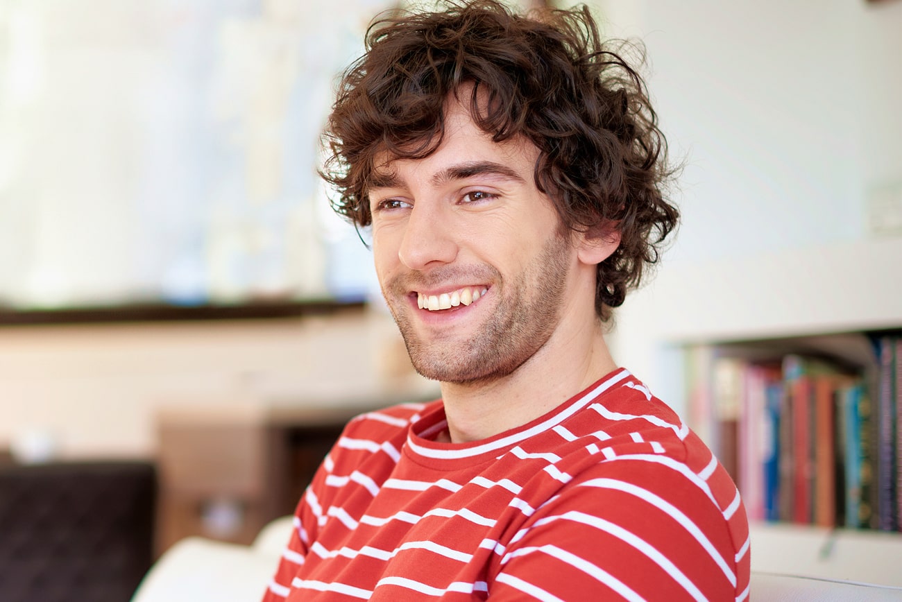 Did-you-know-your-dental-health-is-closely-linked-to-your-overall-well-being dental patient smiling in st charles il