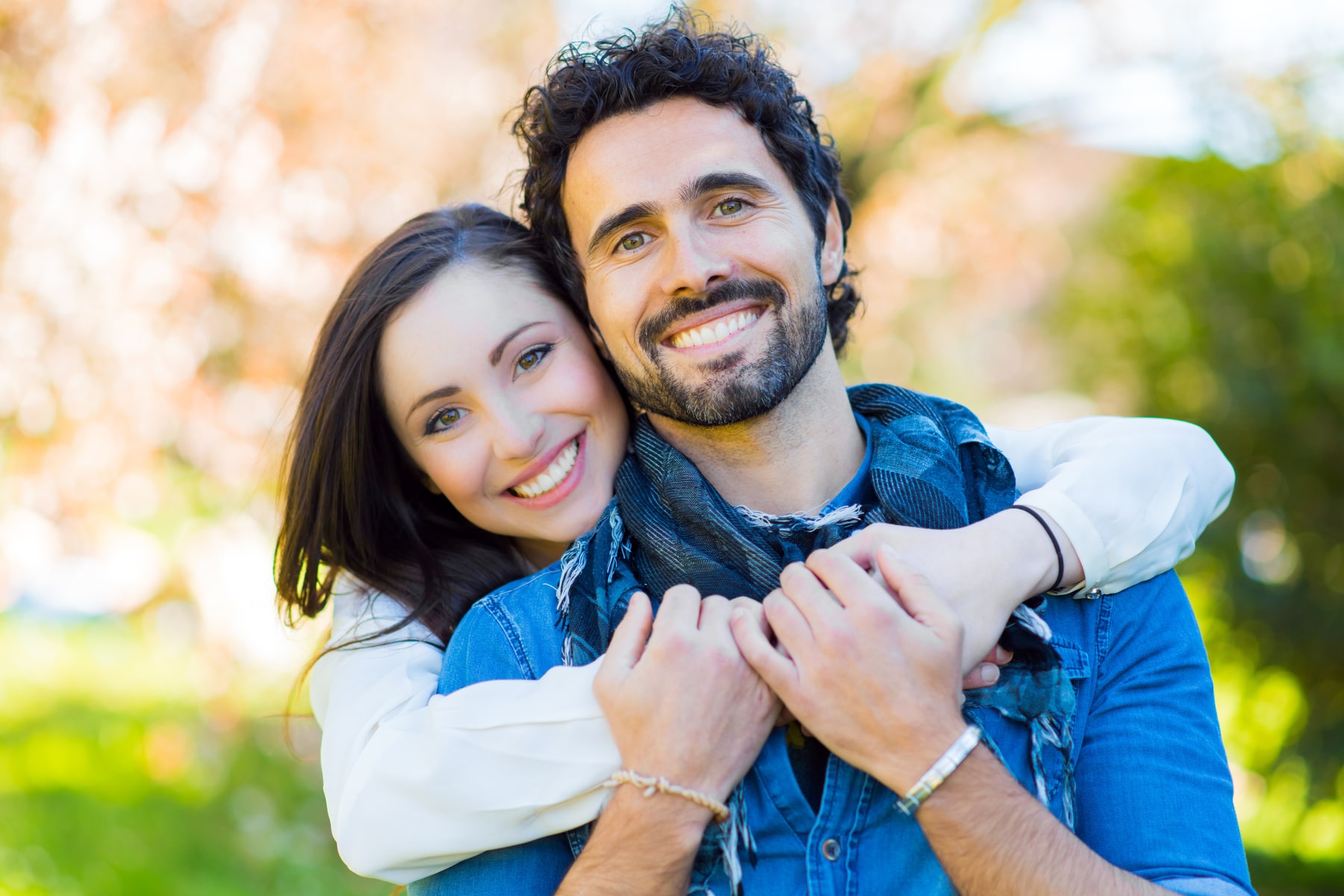 happy couple of patients smiling after their dental cancer screenings from Smile Haven Dental Studio in St Charles IL