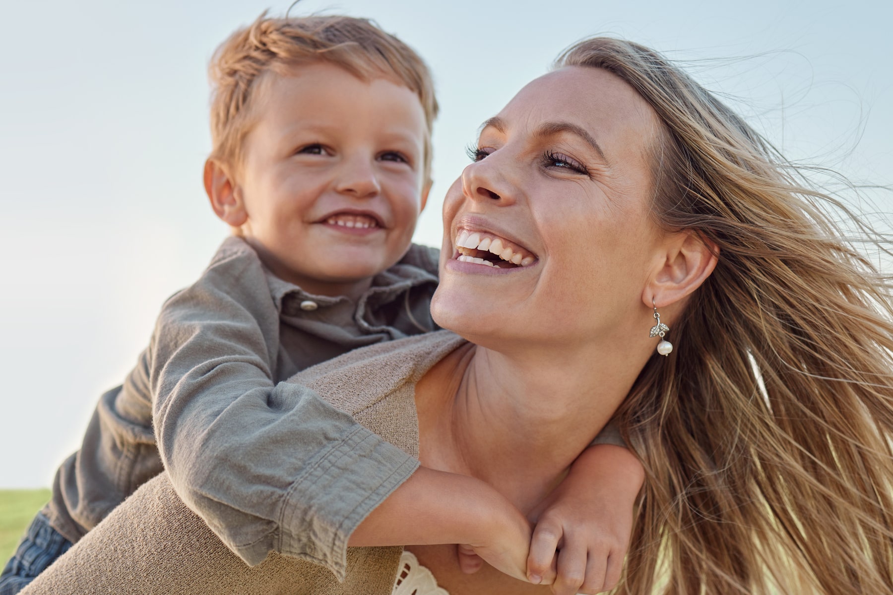 happy family smiling after their fluoride treatment from Smile Haven Dental Studio in St Charles IL