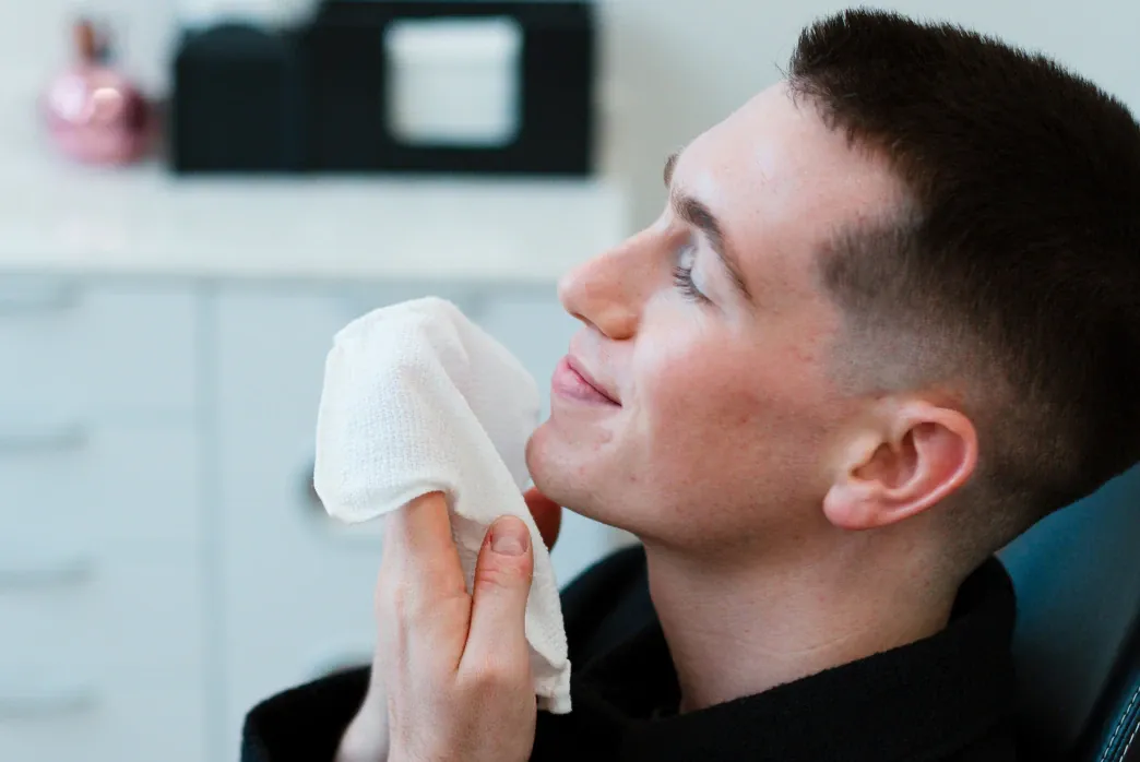 satisfied patient smiling after her comprehensive oral exams from Smile Haven Dental Studio in St Charles IL