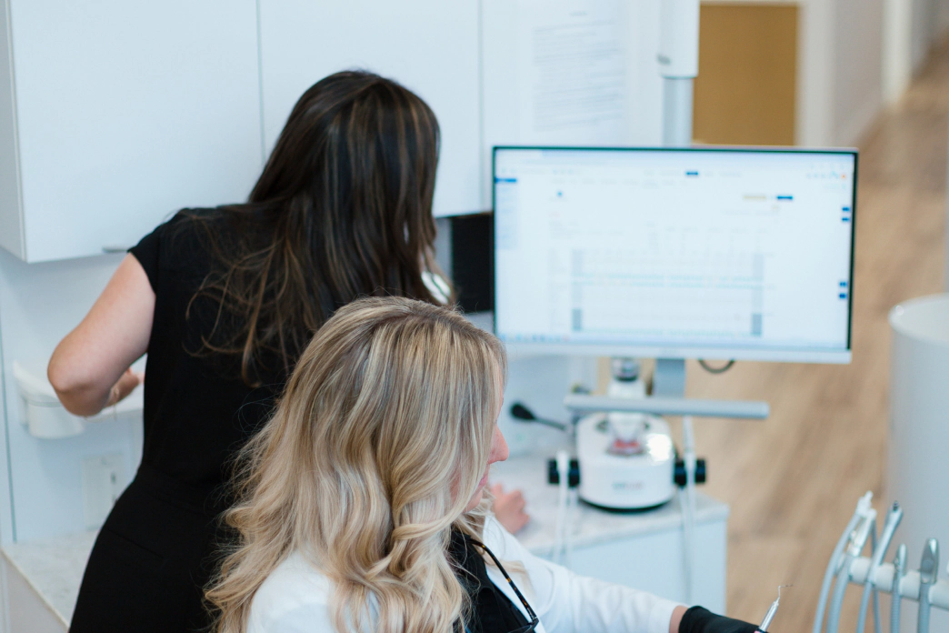Woman smiiling after dental care in St Charles IL