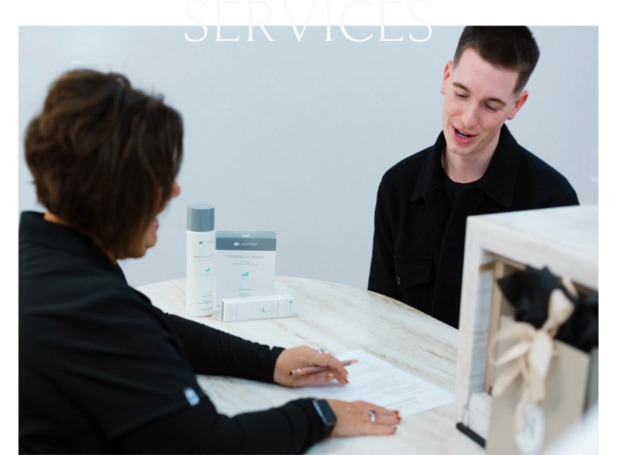 Man and child hugging after the dentist in St. Charles IL